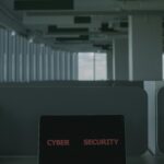 Laptop showing a cyber security message