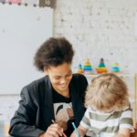 Decorative image of teacher with pupil to demonstrate effective safeguarding practices