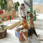 Early Years Children Playing with an Educator