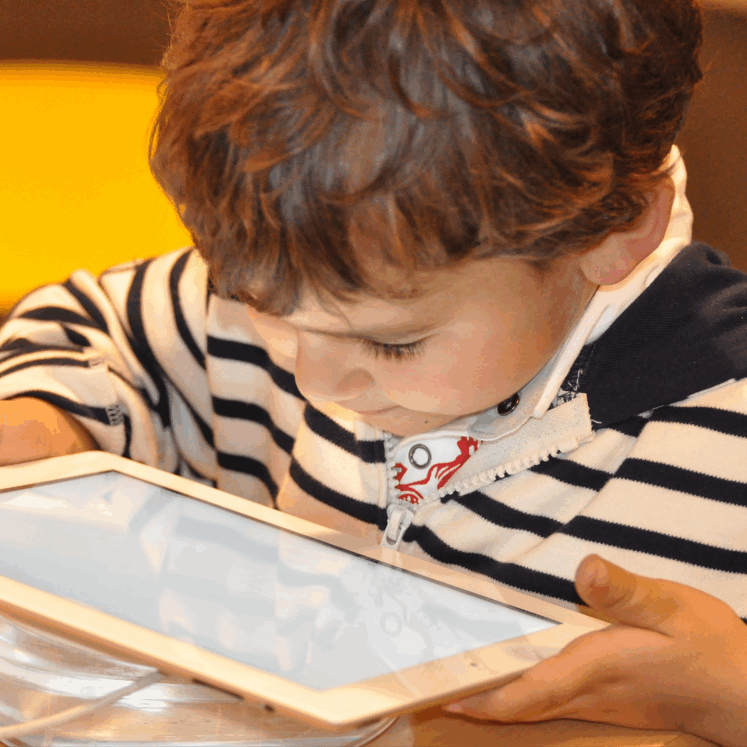 child on tablet